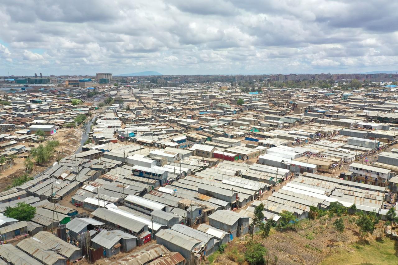 A series of dwellings containing sheet metal roofs.